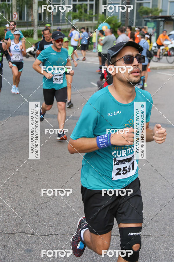 Buy your photos of the eventMeia Maratona Internacional de Curitiba 2018 on Fotop