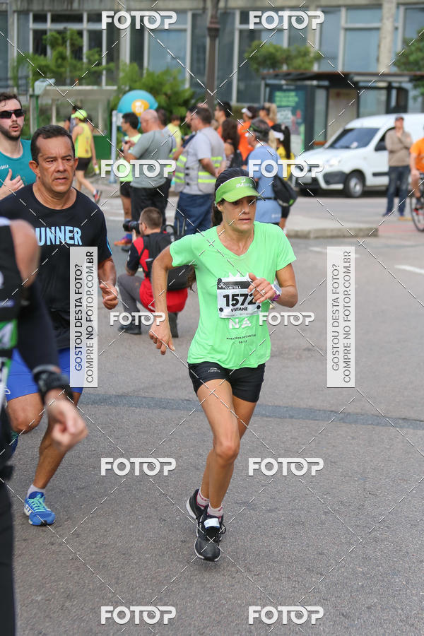 Buy your photos of the eventMeia Maratona Internacional de Curitiba 2018 on Fotop