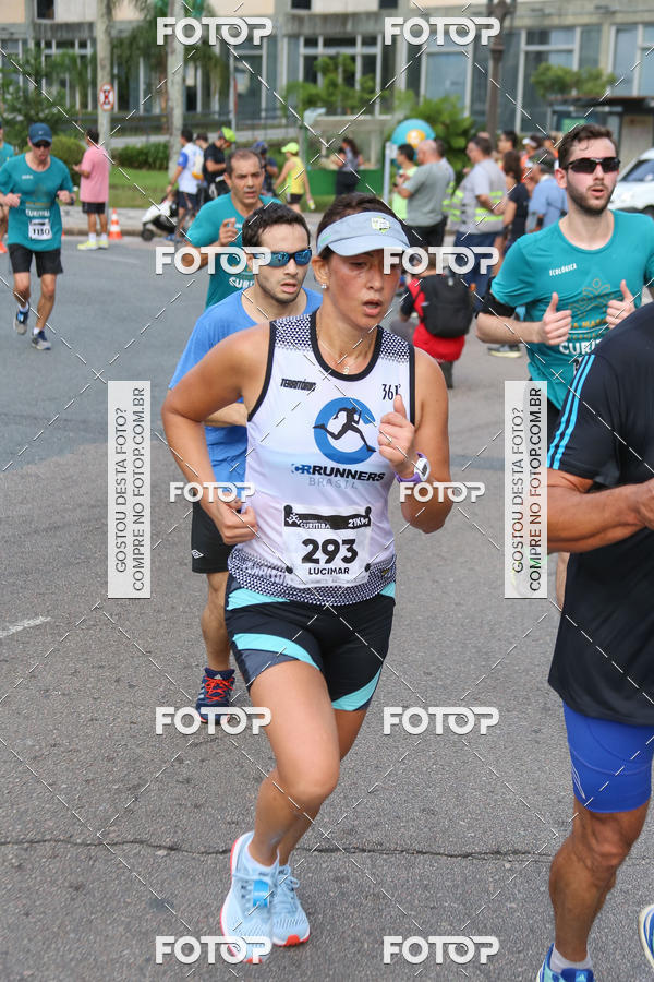 Buy your photos of the eventMeia Maratona Internacional de Curitiba 2018 on Fotop