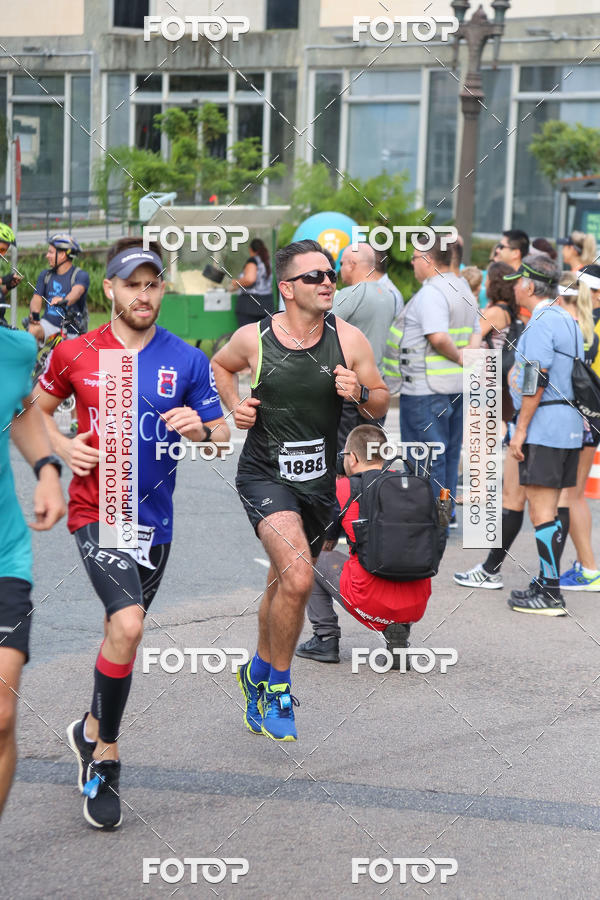 Buy your photos of the eventMeia Maratona Internacional de Curitiba 2018 on Fotop
