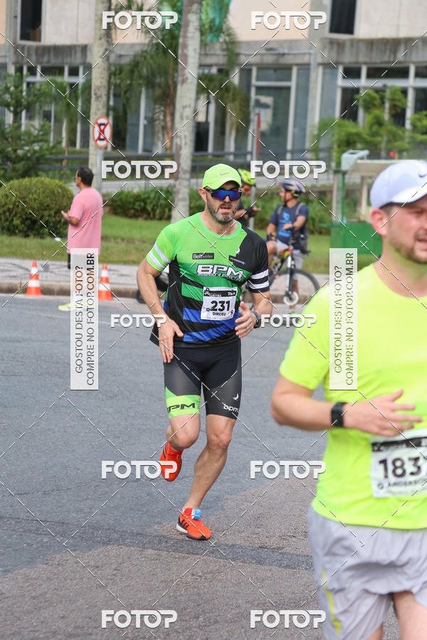 Buy your photos of the eventMeia Maratona Internacional de Curitiba 2018 on Fotop