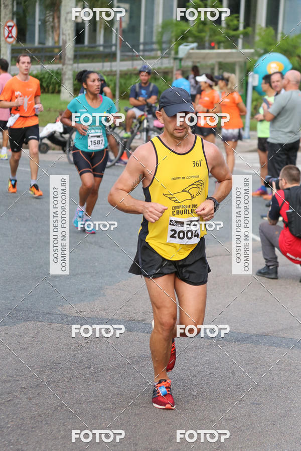 Buy your photos of the eventMeia Maratona Internacional de Curitiba 2018 on Fotop