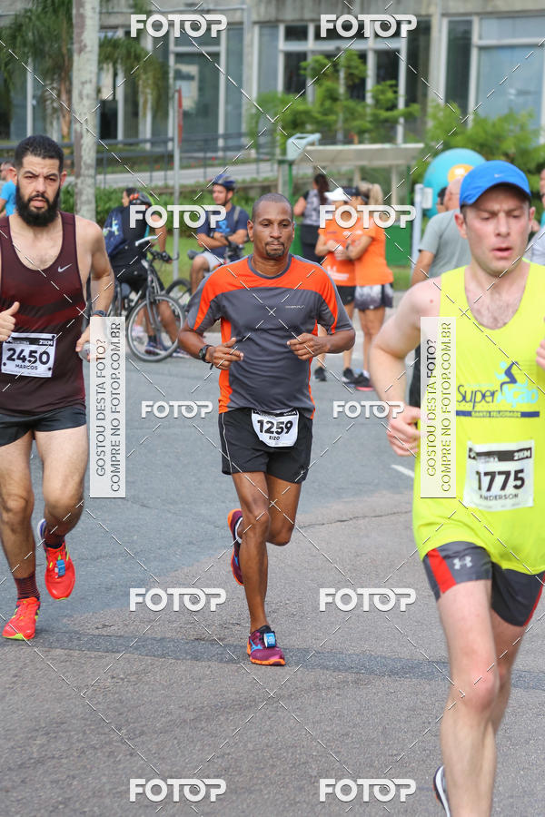 Buy your photos of the eventMeia Maratona Internacional de Curitiba 2018 on Fotop
