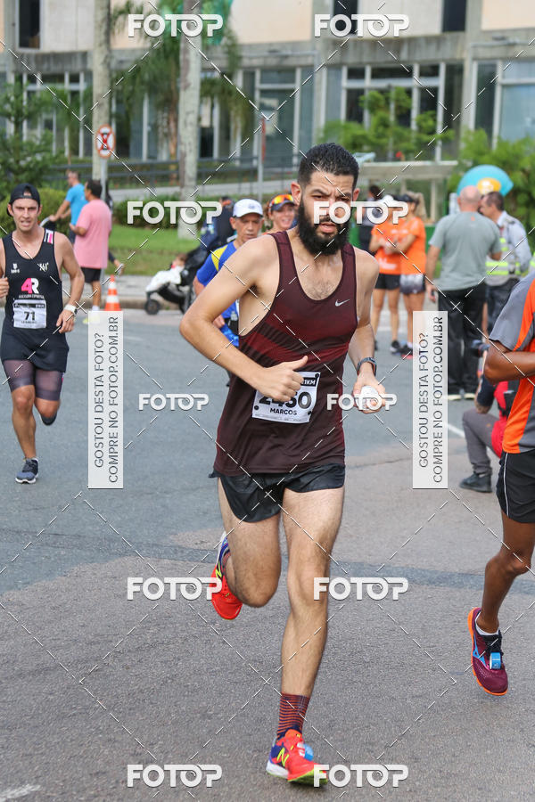 Buy your photos of the eventMeia Maratona Internacional de Curitiba 2018 on Fotop
