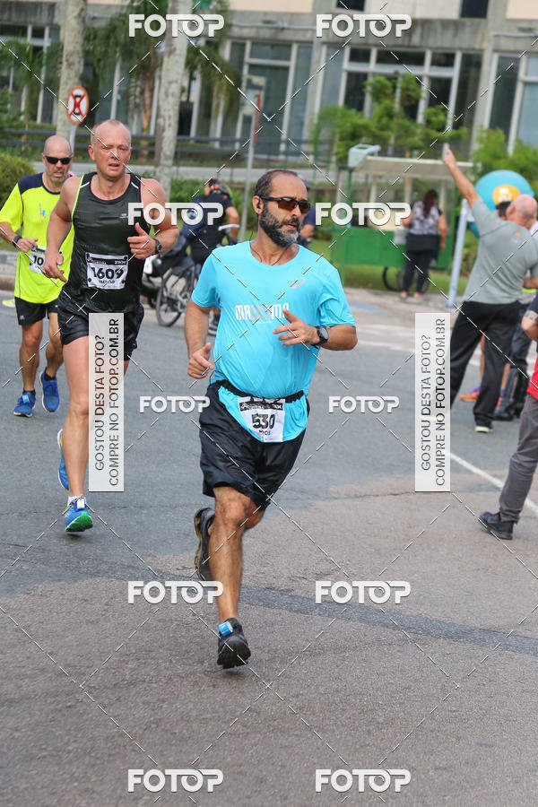 Buy your photos of the eventMeia Maratona Internacional de Curitiba 2018 on Fotop
