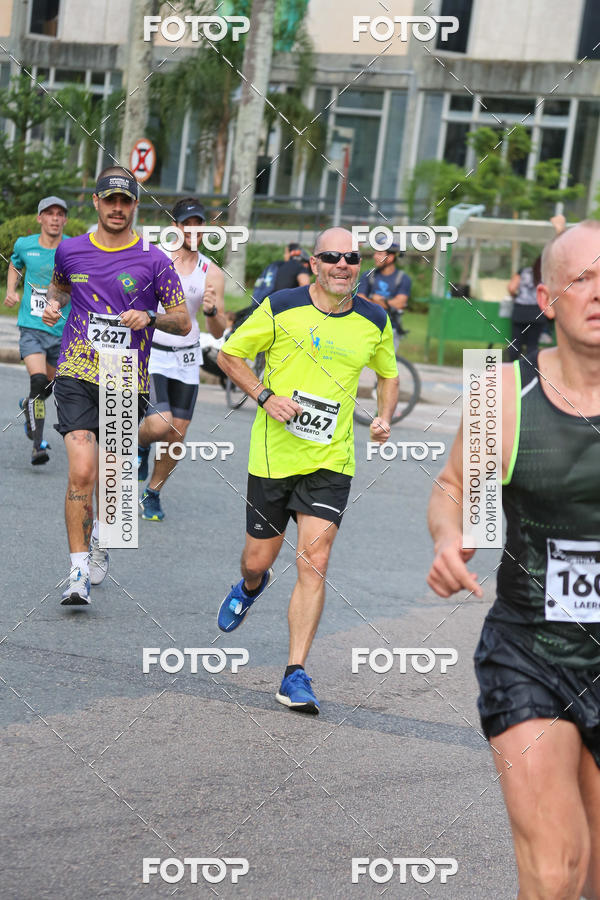 Buy your photos of the eventMeia Maratona Internacional de Curitiba 2018 on Fotop