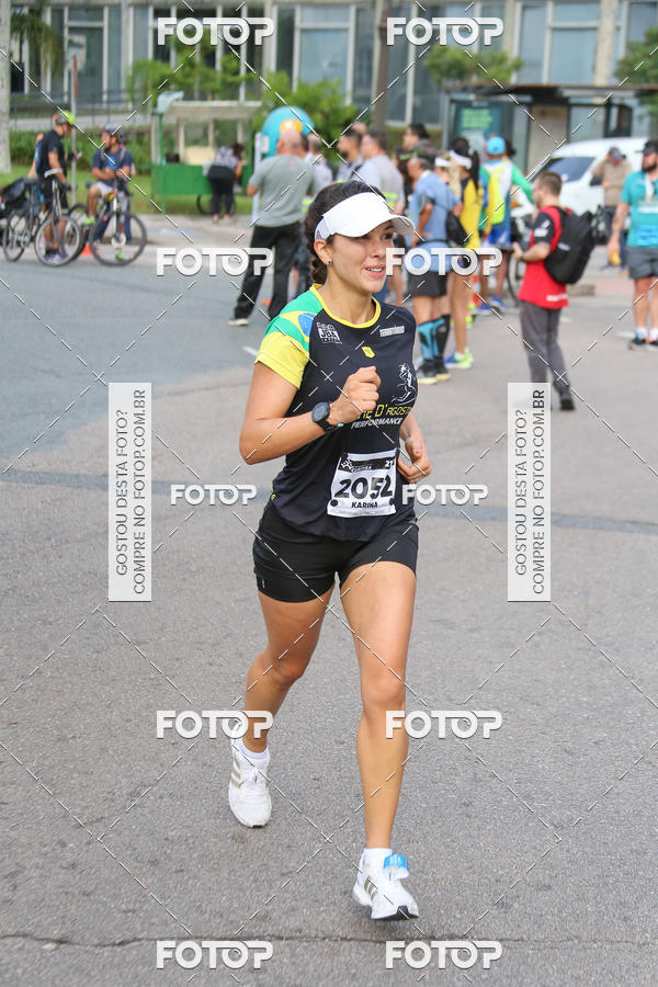 Buy your photos of the eventMeia Maratona Internacional de Curitiba 2018 on Fotop