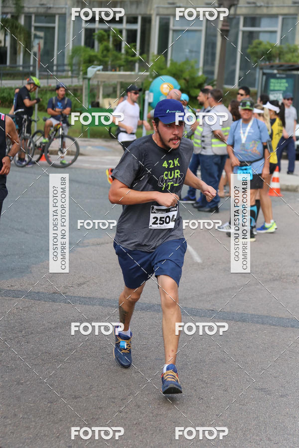 Buy your photos of the eventMeia Maratona Internacional de Curitiba 2018 on Fotop
