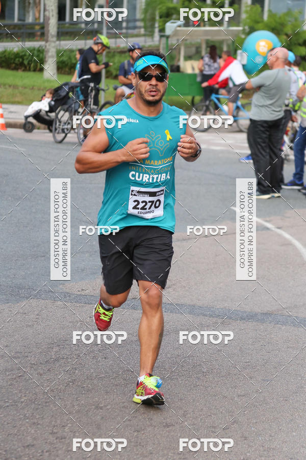 Buy your photos of the eventMeia Maratona Internacional de Curitiba 2018 on Fotop