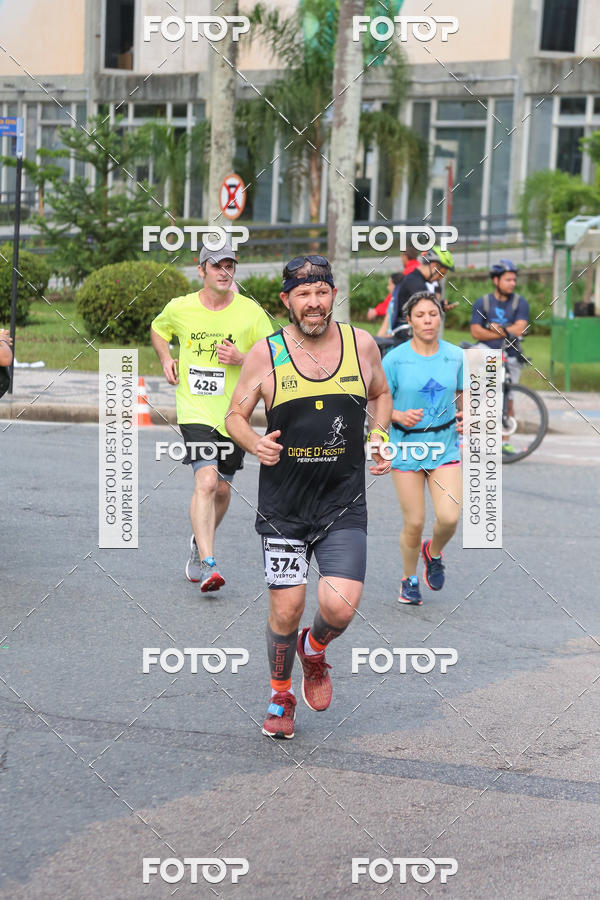 Buy your photos of the eventMeia Maratona Internacional de Curitiba 2018 on Fotop