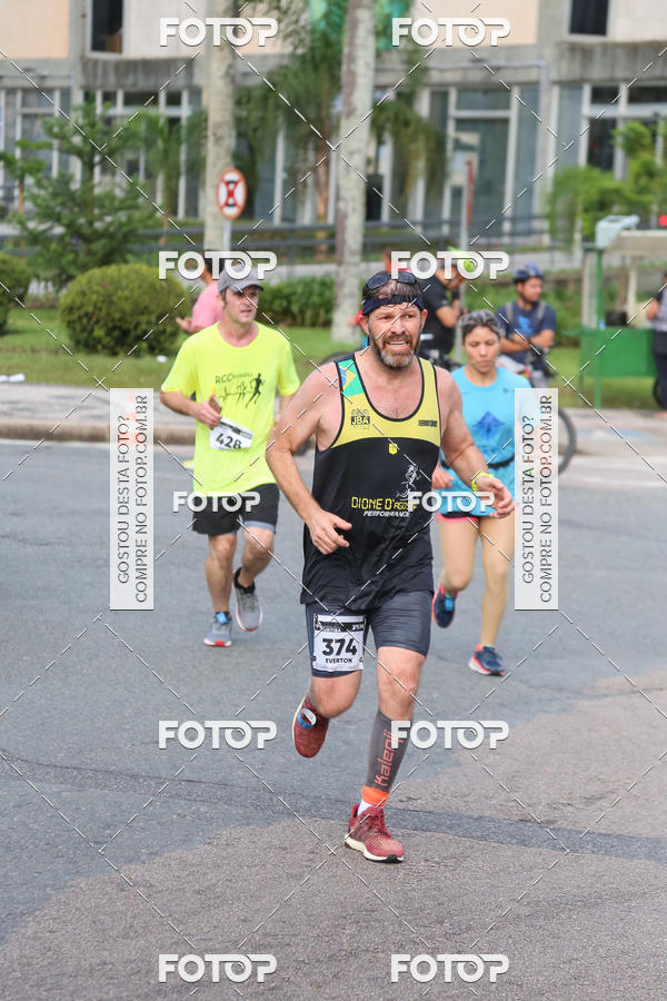 Buy your photos of the eventMeia Maratona Internacional de Curitiba 2018 on Fotop