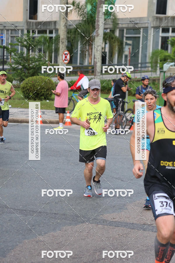 Buy your photos of the eventMeia Maratona Internacional de Curitiba 2018 on Fotop