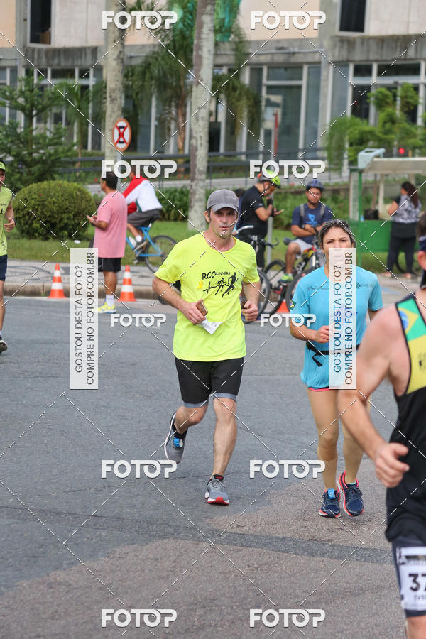Buy your photos of the eventMeia Maratona Internacional de Curitiba 2018 on Fotop