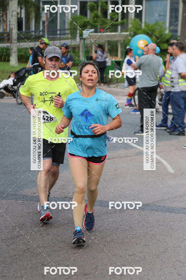 Buy your photos of the eventMeia Maratona Internacional de Curitiba 2018 on Fotop