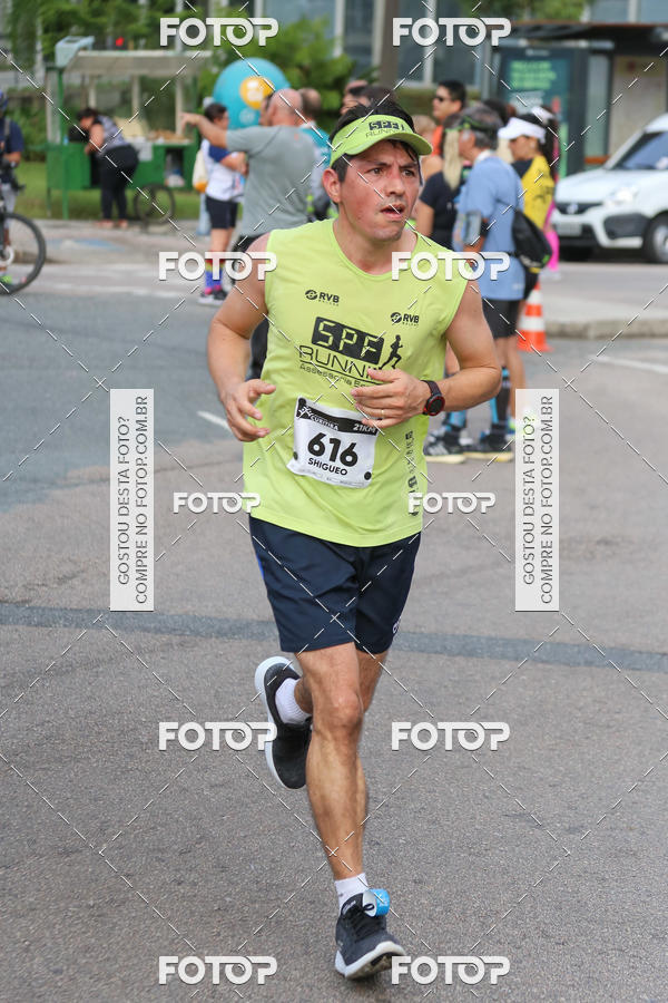 Buy your photos of the eventMeia Maratona Internacional de Curitiba 2018 on Fotop