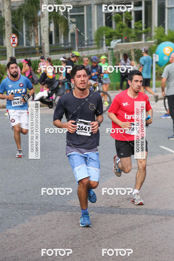 Buy your photos of the eventMeia Maratona Internacional de Curitiba 2018 on Fotop