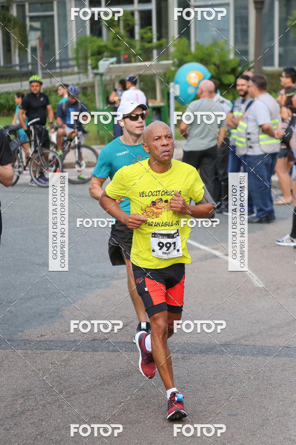 Buy your photos of the eventMeia Maratona Internacional de Curitiba 2018 on Fotop