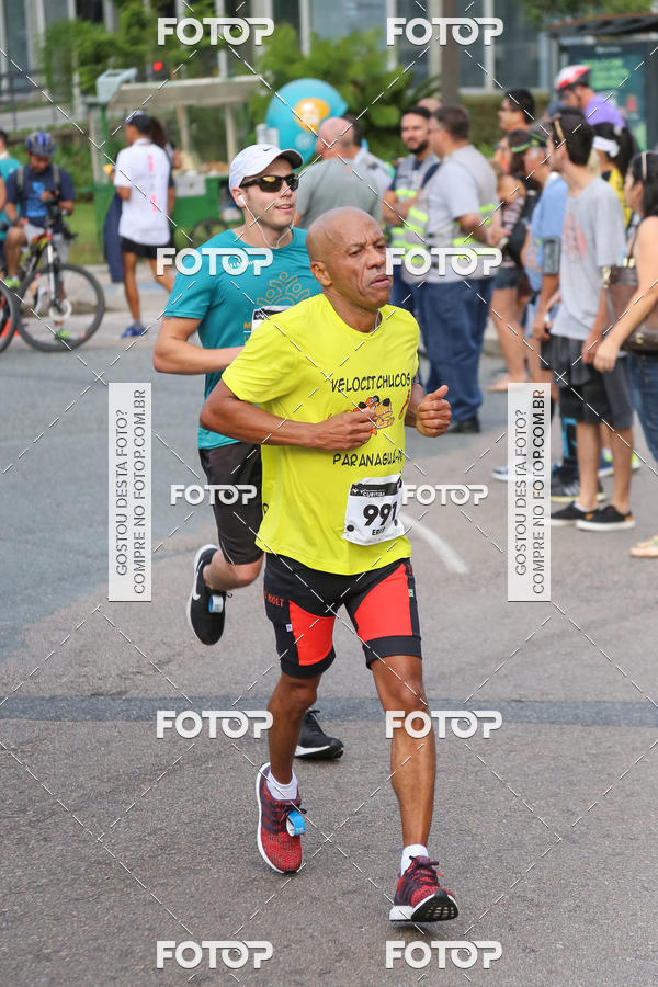 Buy your photos of the eventMeia Maratona Internacional de Curitiba 2018 on Fotop