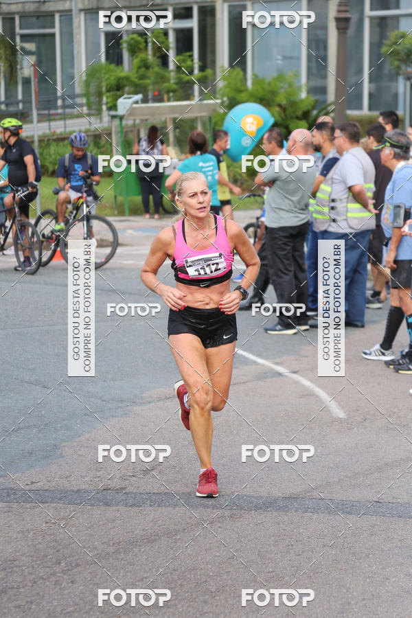 Buy your photos of the eventMeia Maratona Internacional de Curitiba 2018 on Fotop