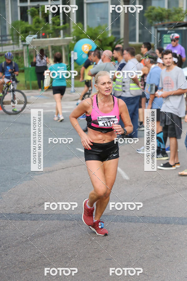 Buy your photos of the eventMeia Maratona Internacional de Curitiba 2018 on Fotop