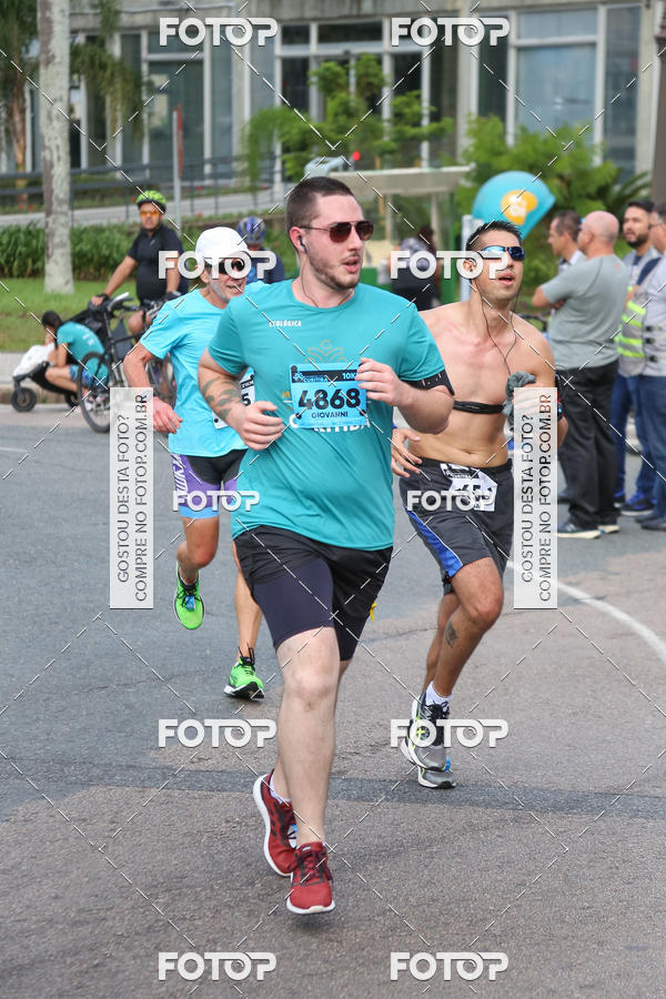 Buy your photos of the eventMeia Maratona Internacional de Curitiba 2018 on Fotop