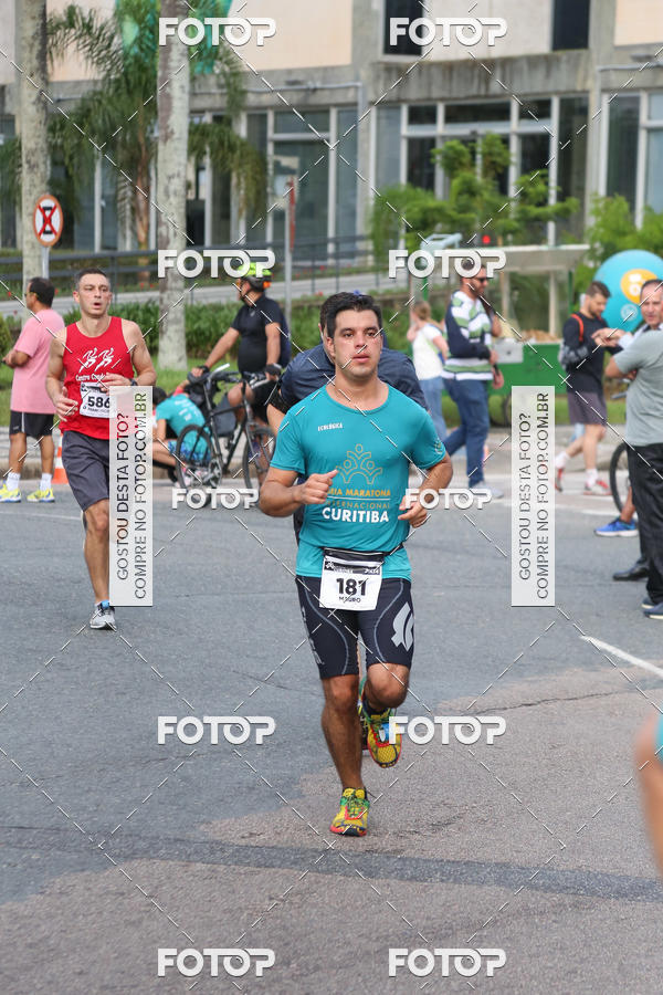 Buy your photos of the eventMeia Maratona Internacional de Curitiba 2018 on Fotop