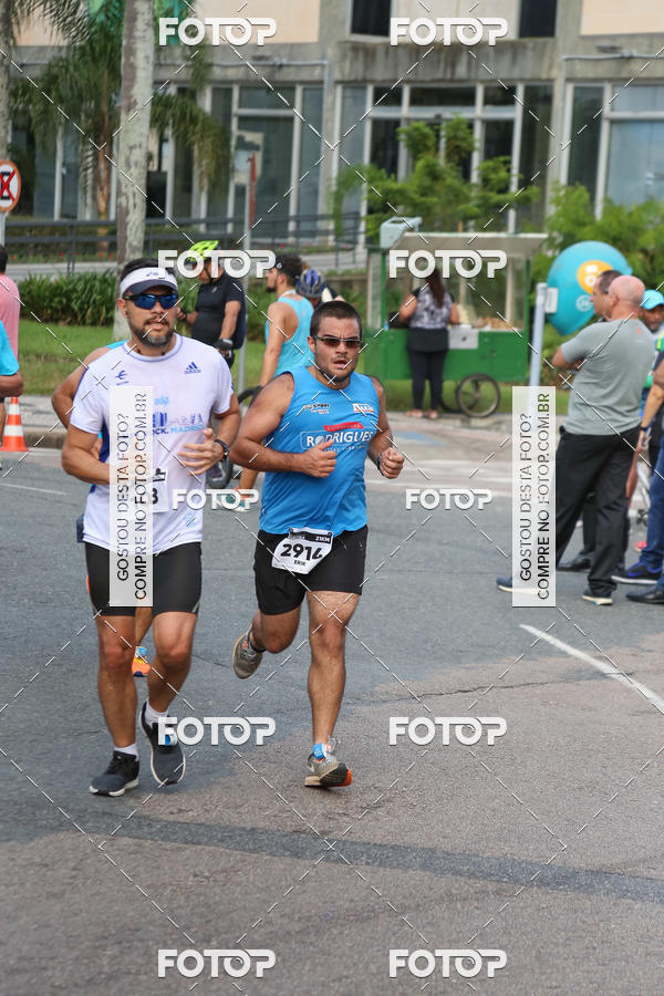 Buy your photos of the eventMeia Maratona Internacional de Curitiba 2018 on Fotop