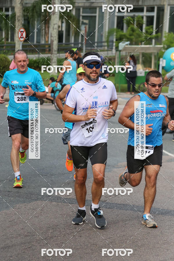 Buy your photos of the eventMeia Maratona Internacional de Curitiba 2018 on Fotop