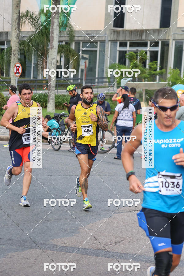 Buy your photos of the eventMeia Maratona Internacional de Curitiba 2018 on Fotop