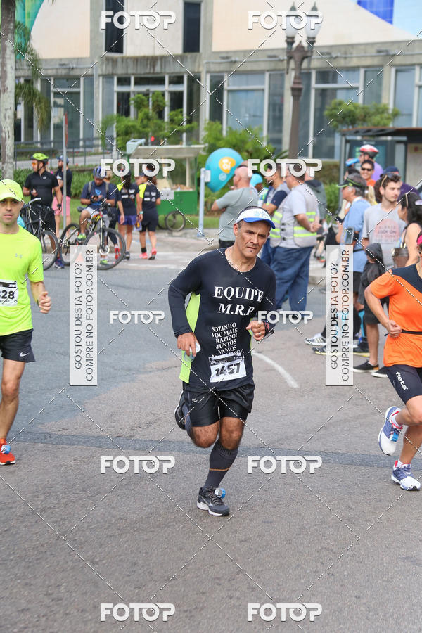 Buy your photos of the eventMeia Maratona Internacional de Curitiba 2018 on Fotop