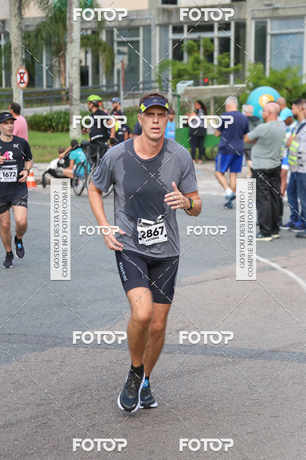 Buy your photos of the eventMeia Maratona Internacional de Curitiba 2018 on Fotop