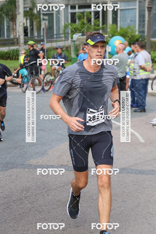 Buy your photos of the eventMeia Maratona Internacional de Curitiba 2018 on Fotop
