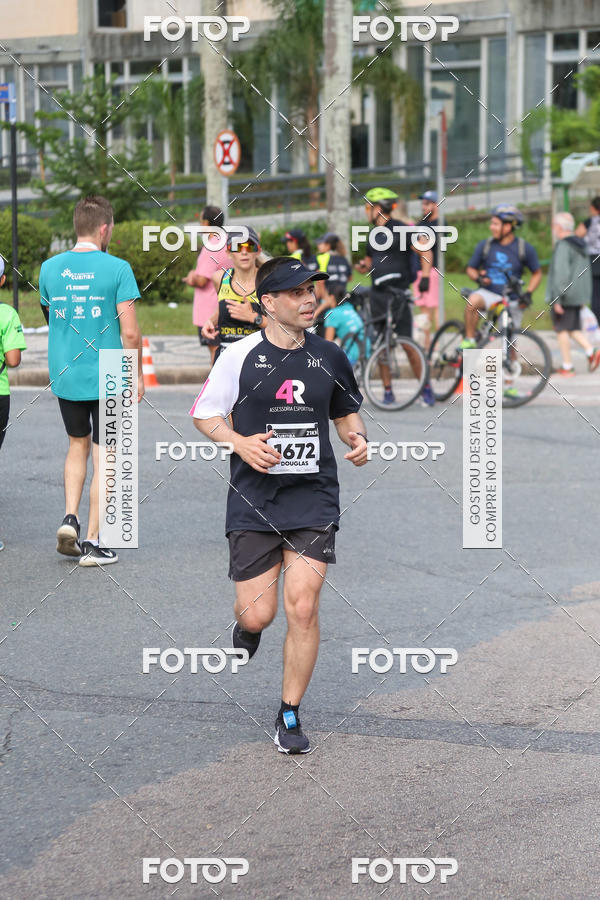 Buy your photos of the eventMeia Maratona Internacional de Curitiba 2018 on Fotop