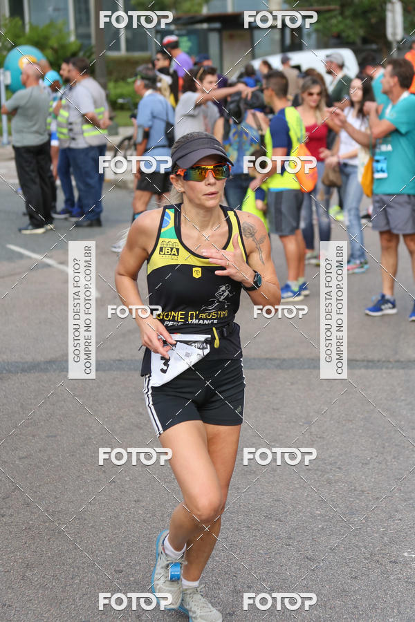 Buy your photos of the eventMeia Maratona Internacional de Curitiba 2018 on Fotop