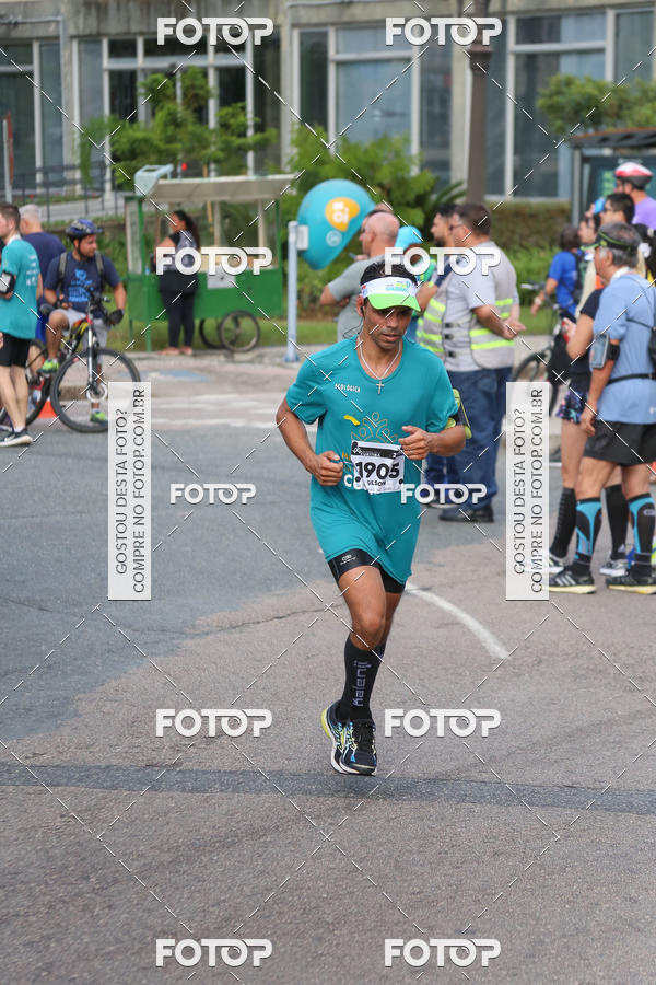Buy your photos of the eventMeia Maratona Internacional de Curitiba 2018 on Fotop