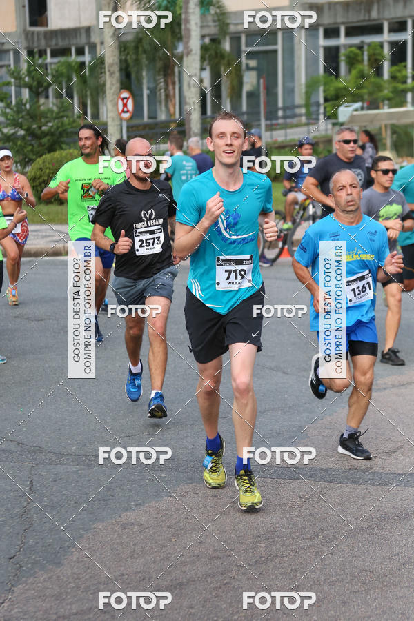 Buy your photos of the eventMeia Maratona Internacional de Curitiba 2018 on Fotop