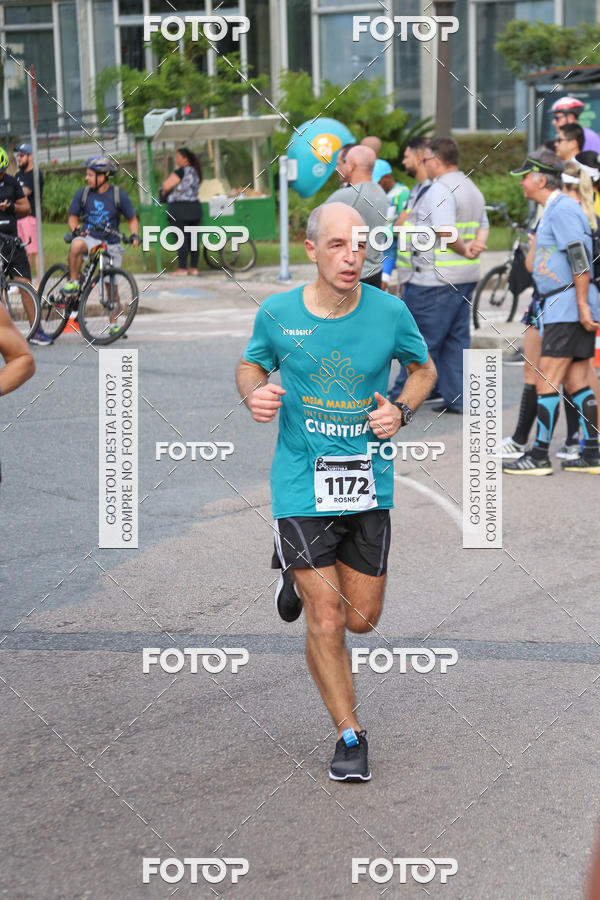 Buy your photos of the eventMeia Maratona Internacional de Curitiba 2018 on Fotop
