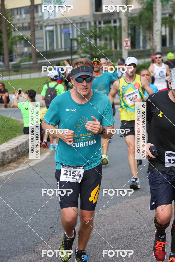 Buy your photos of the eventMeia Maratona Internacional de Curitiba 2018 on Fotop