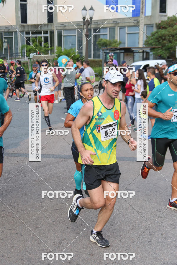 Buy your photos of the eventMeia Maratona Internacional de Curitiba 2018 on Fotop