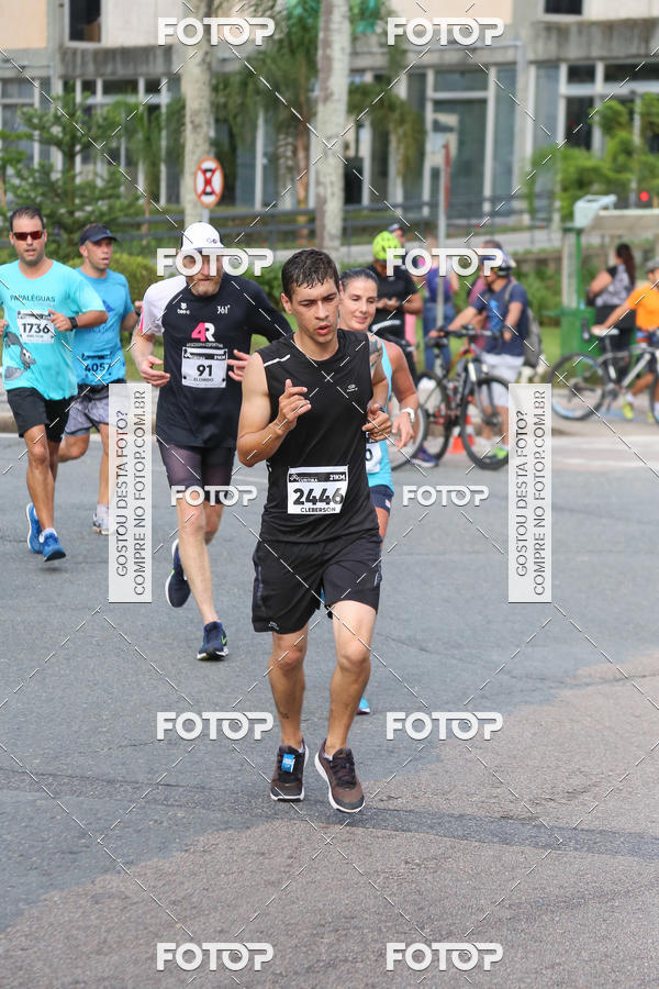 Buy your photos of the eventMeia Maratona Internacional de Curitiba 2018 on Fotop