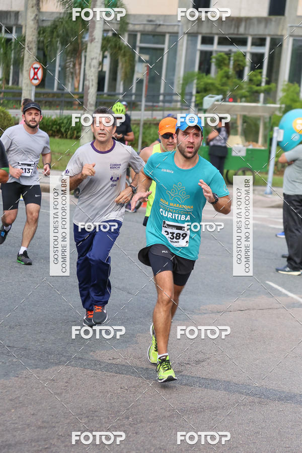Buy your photos of the eventMeia Maratona Internacional de Curitiba 2018 on Fotop