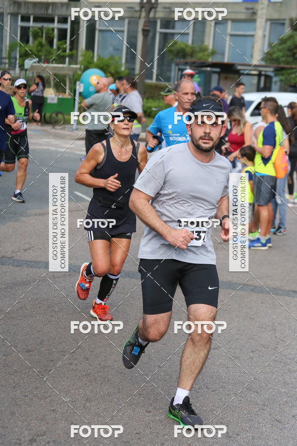 Buy your photos of the eventMeia Maratona Internacional de Curitiba 2018 on Fotop