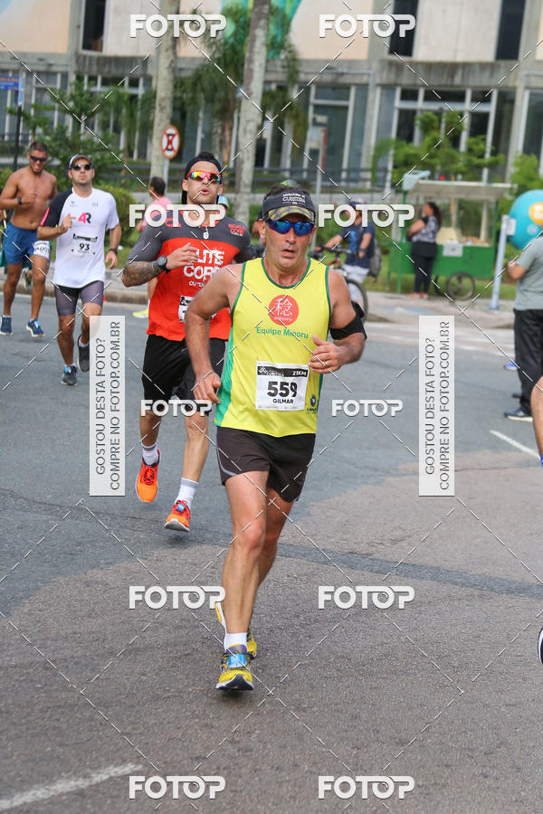 Buy your photos of the eventMeia Maratona Internacional de Curitiba 2018 on Fotop