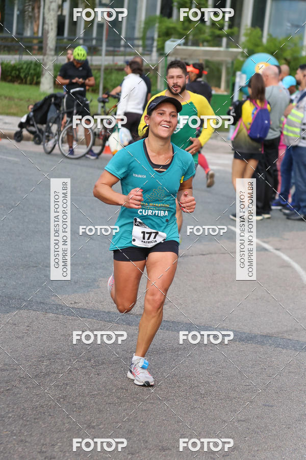 Buy your photos of the eventMeia Maratona Internacional de Curitiba 2018 on Fotop