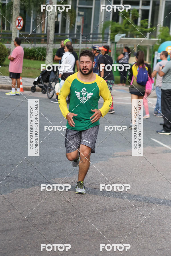 Buy your photos of the eventMeia Maratona Internacional de Curitiba 2018 on Fotop