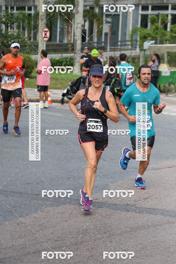 Buy your photos of the eventMeia Maratona Internacional de Curitiba 2018 on Fotop