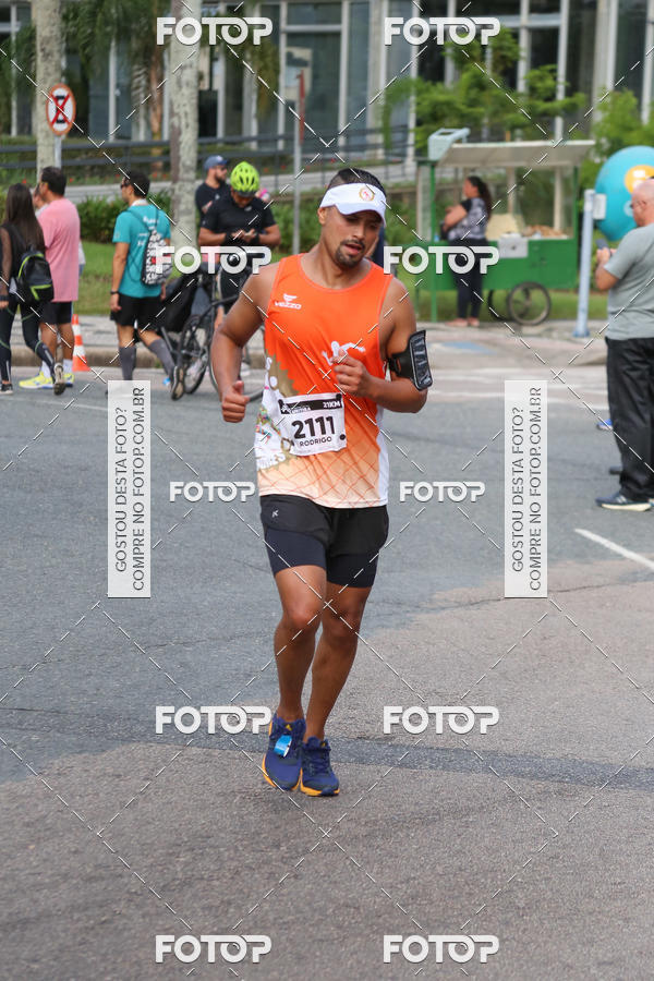 Buy your photos of the eventMeia Maratona Internacional de Curitiba 2018 on Fotop