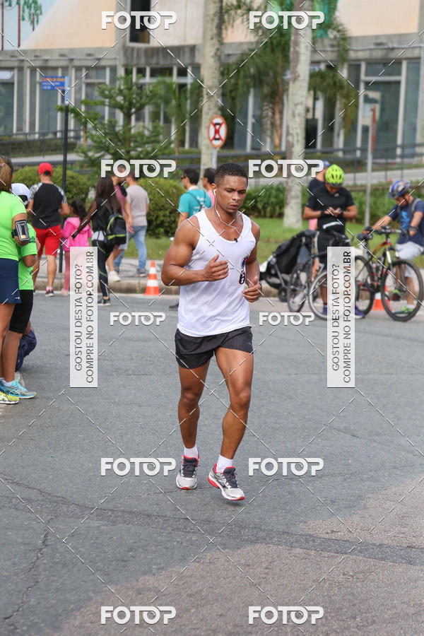 Buy your photos of the eventMeia Maratona Internacional de Curitiba 2018 on Fotop