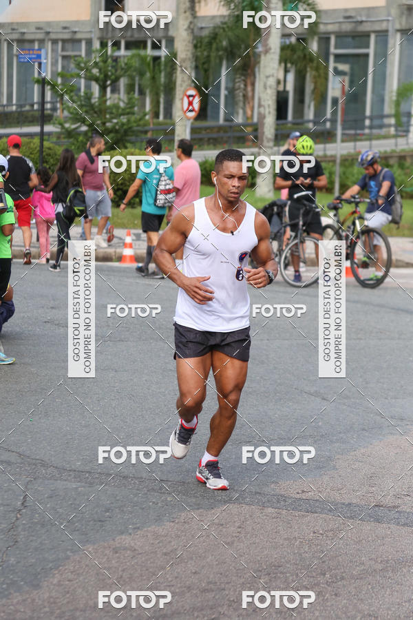 Buy your photos of the eventMeia Maratona Internacional de Curitiba 2018 on Fotop