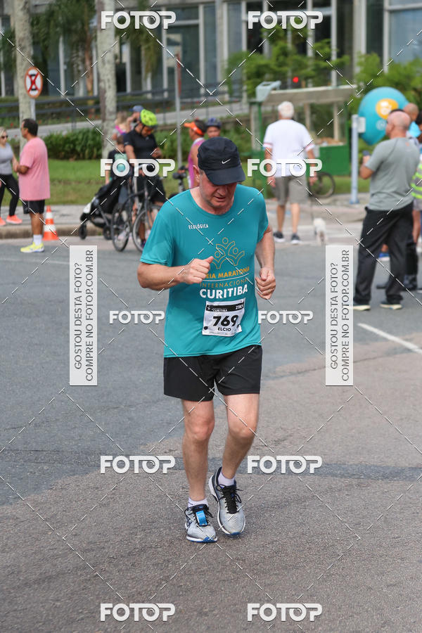 Buy your photos of the eventMeia Maratona Internacional de Curitiba 2018 on Fotop
